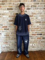 NAVY "CHAOS CREATES" BAGGY SUNFADED PANTS