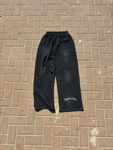 BLACK "CHAOS CREATES" BAGGY SUNFADED PANTS