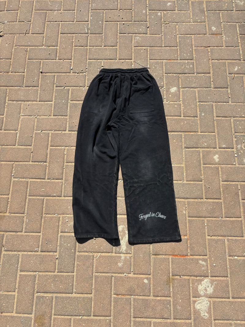 BLACK "CHAOS CREATES" BAGGY SUNFADED PANTS
