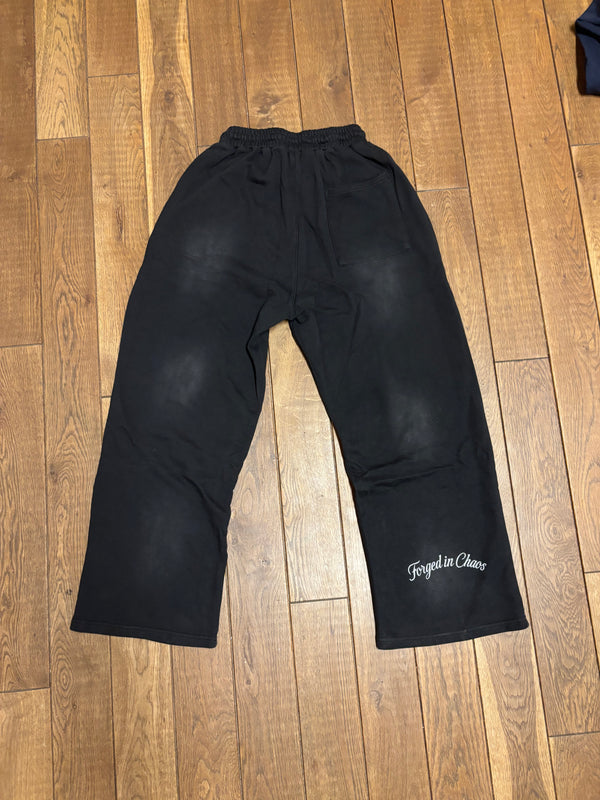 BLACK "CHAOS CREATES" BAGGY SUNFADED PANTS