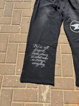 BLACK "CHAOS CREATES" BAGGY SUNFADED PANTS