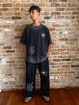 BLACK "CHAOS CREATES" BAGGY SUNFADED PANTS
