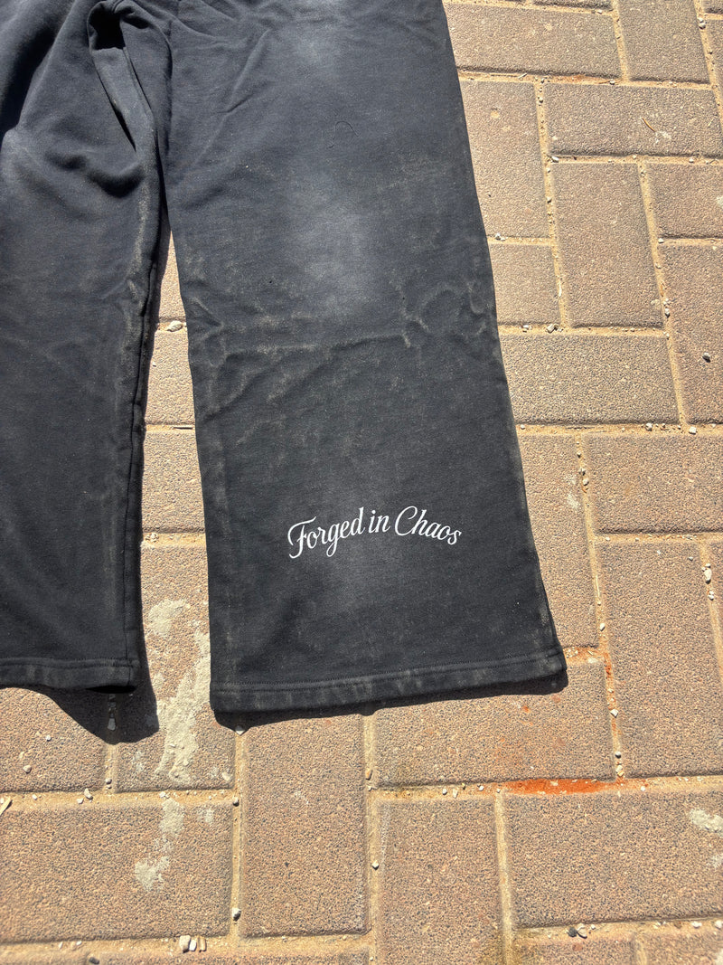 BLACK "CHAOS CREATES" BAGGY SUNFADED PANTS